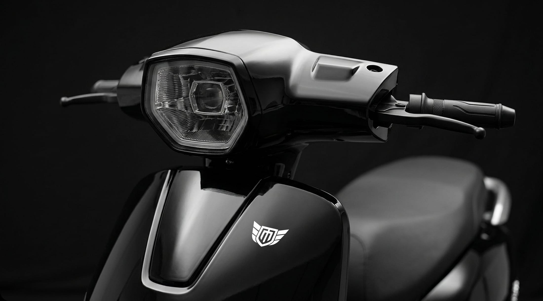 LED headlamp and handlebar console on the Mercury DLX GOLD electric scooter