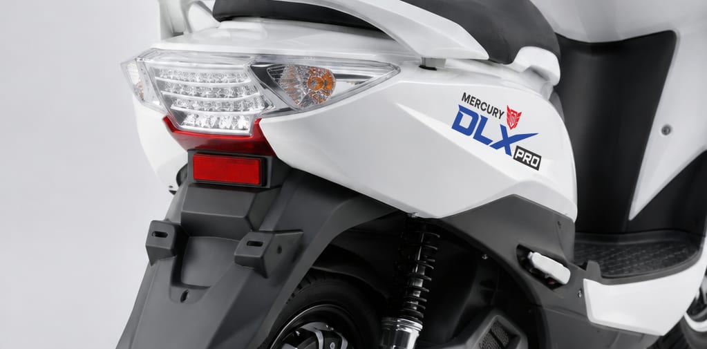 LED tail light and rear suspension on the white Mercury DLX PRO electric scooter