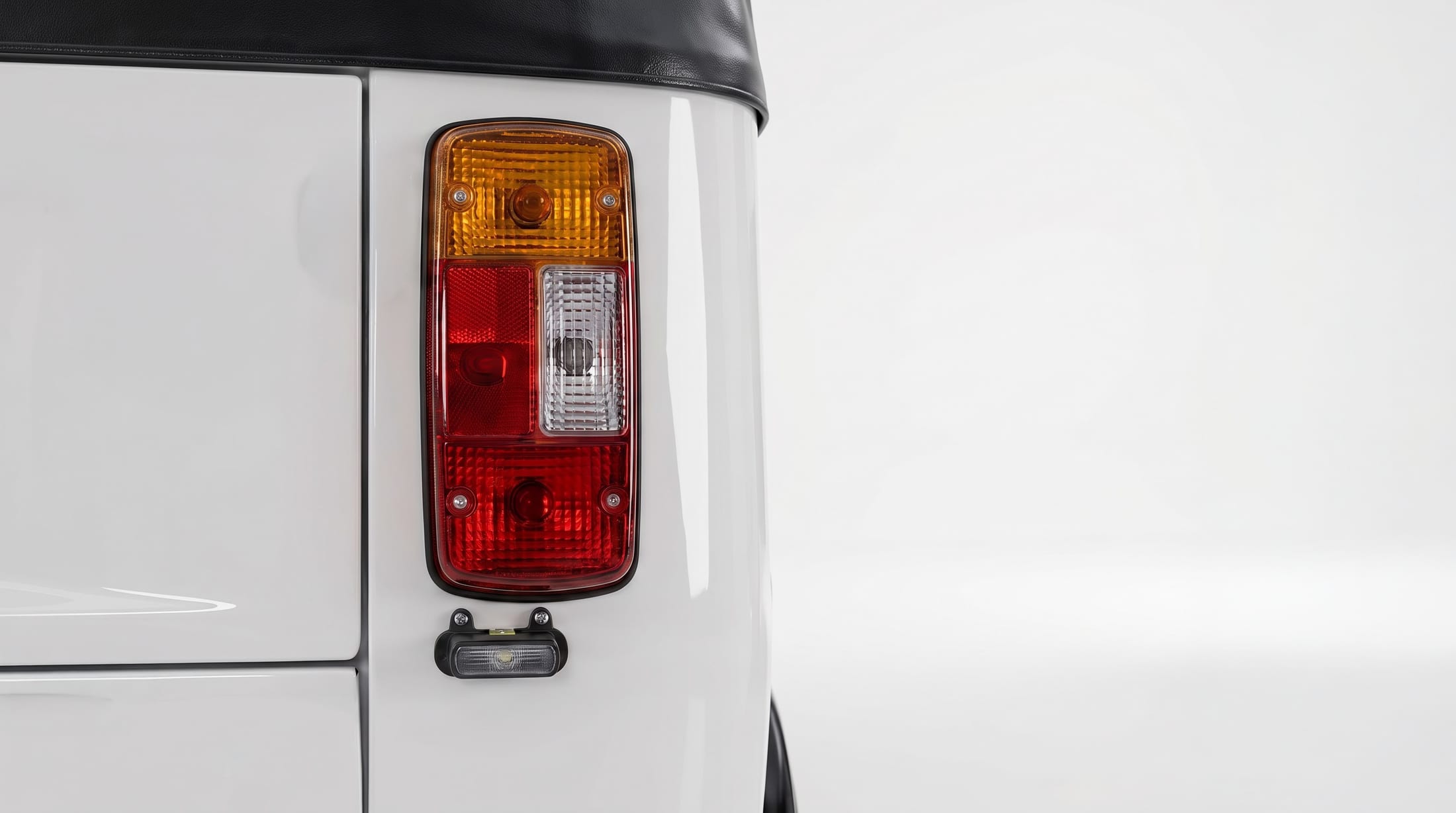 Rear tail light cluster on the Mercury Limosa electric passenger auto